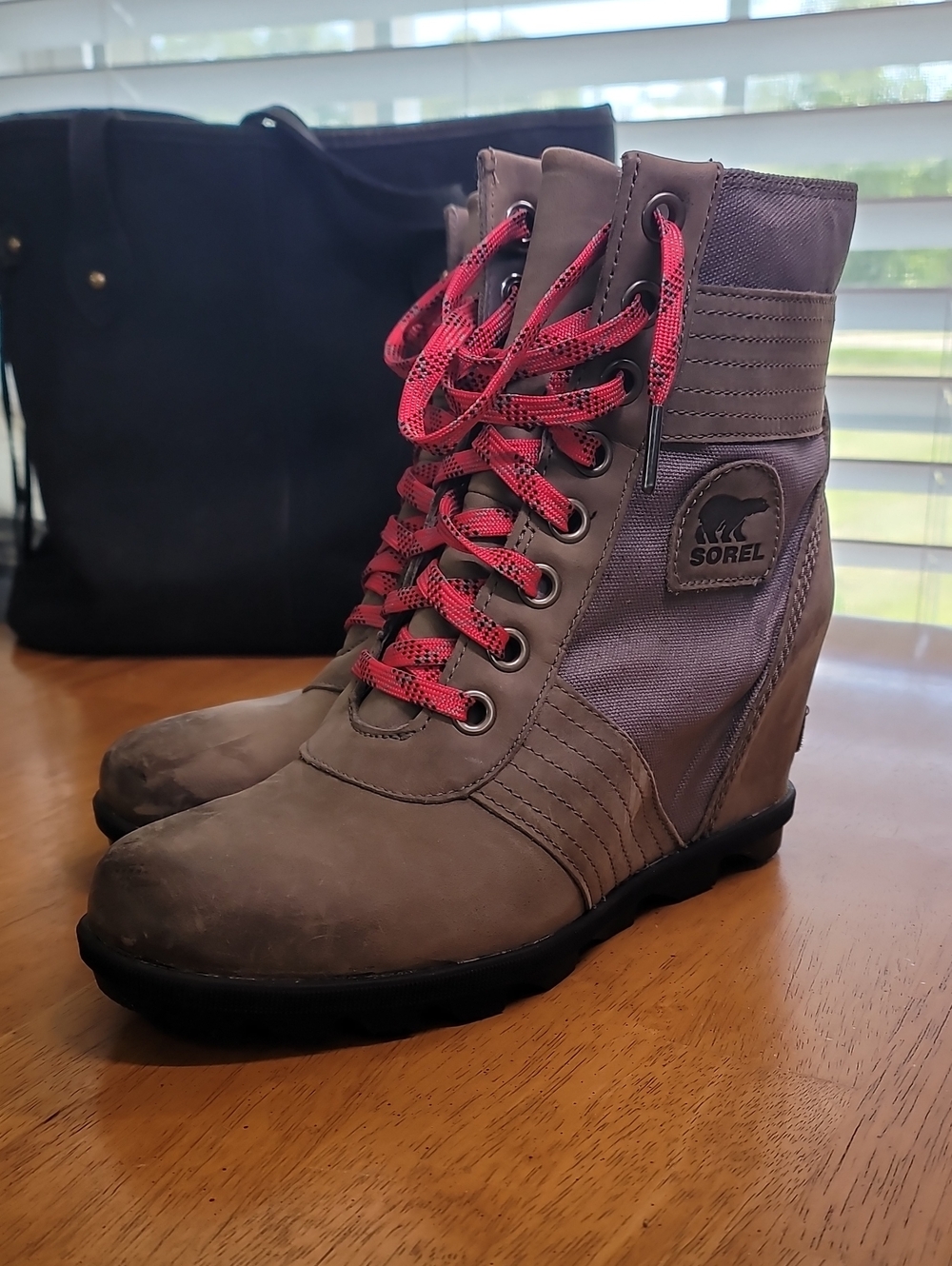 Sorel Lexie Wedge boots in a quarry gray leather and canvas combination